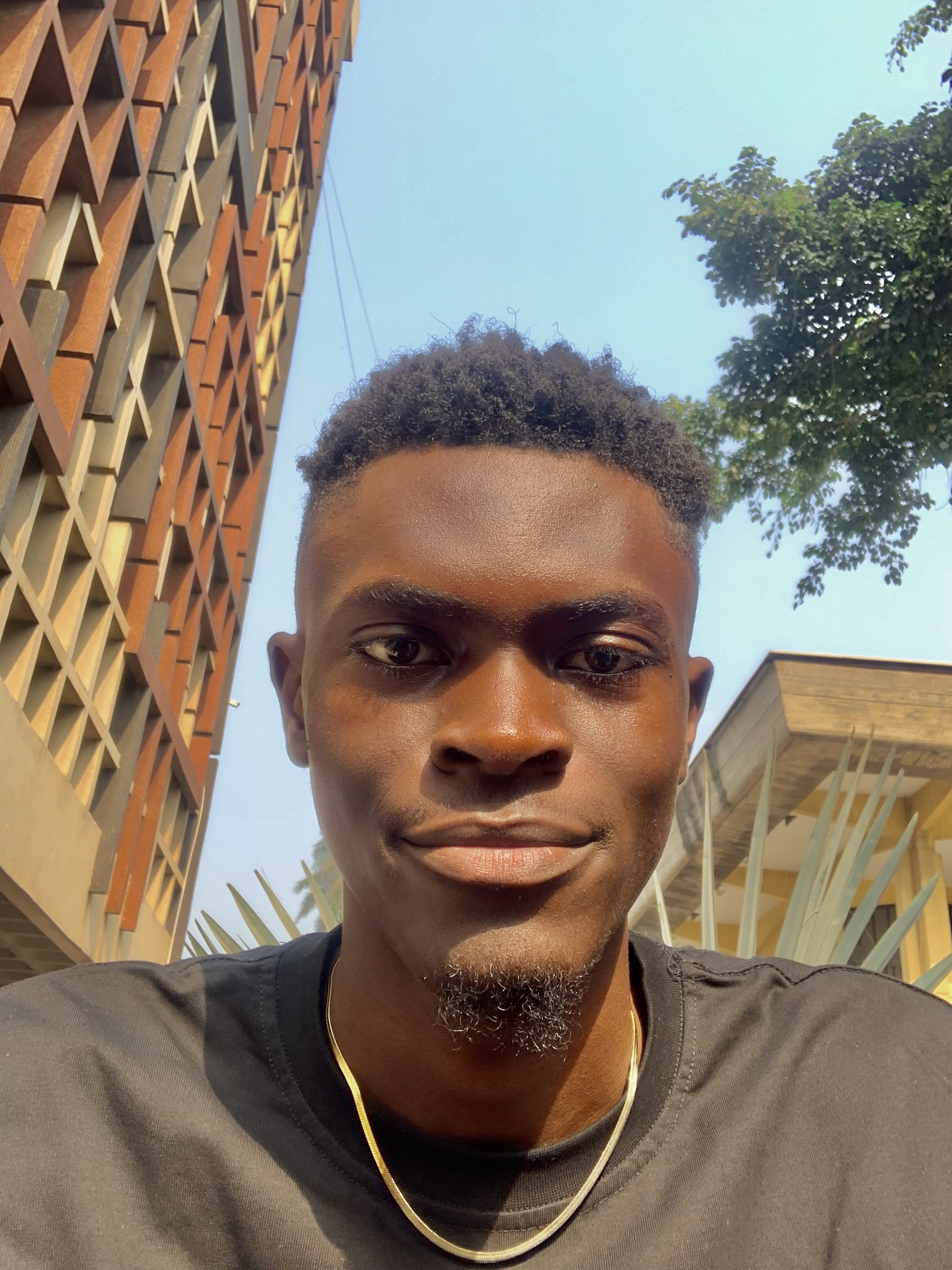 Headshot of Ogunlade Kayode, a Frontend Developer